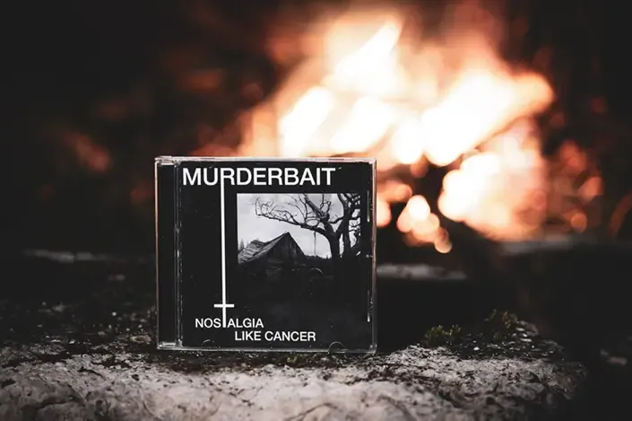 Murderbait CD on fire